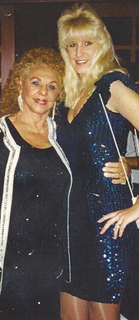 WWF Woman's Champion Fabulous Moolah & IWF Woman's Champion Brittany Brown